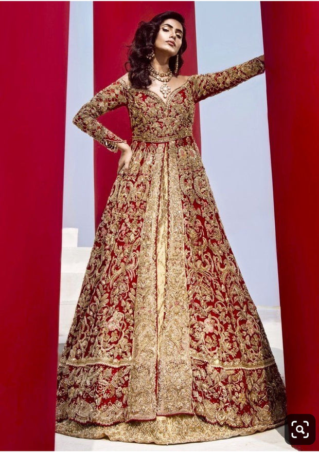 Dulhan Maxi Lahnga In Hot Red Color.Work Embellished With Heavy Dabka Nagh Zari Crystal And Nagh Work.