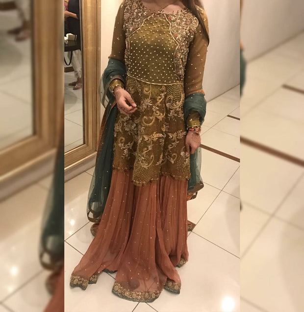 Wedding party sharara green and copper color with heavy dabka nagh perls and zari work Model#P1113