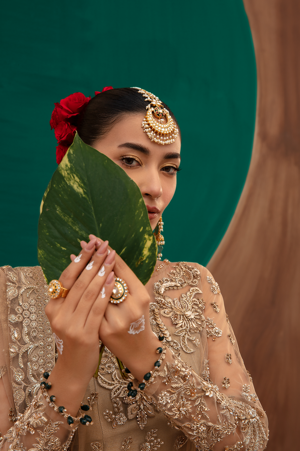 Pakistani Bridal Dress in Gold Net with Flared Lehnga