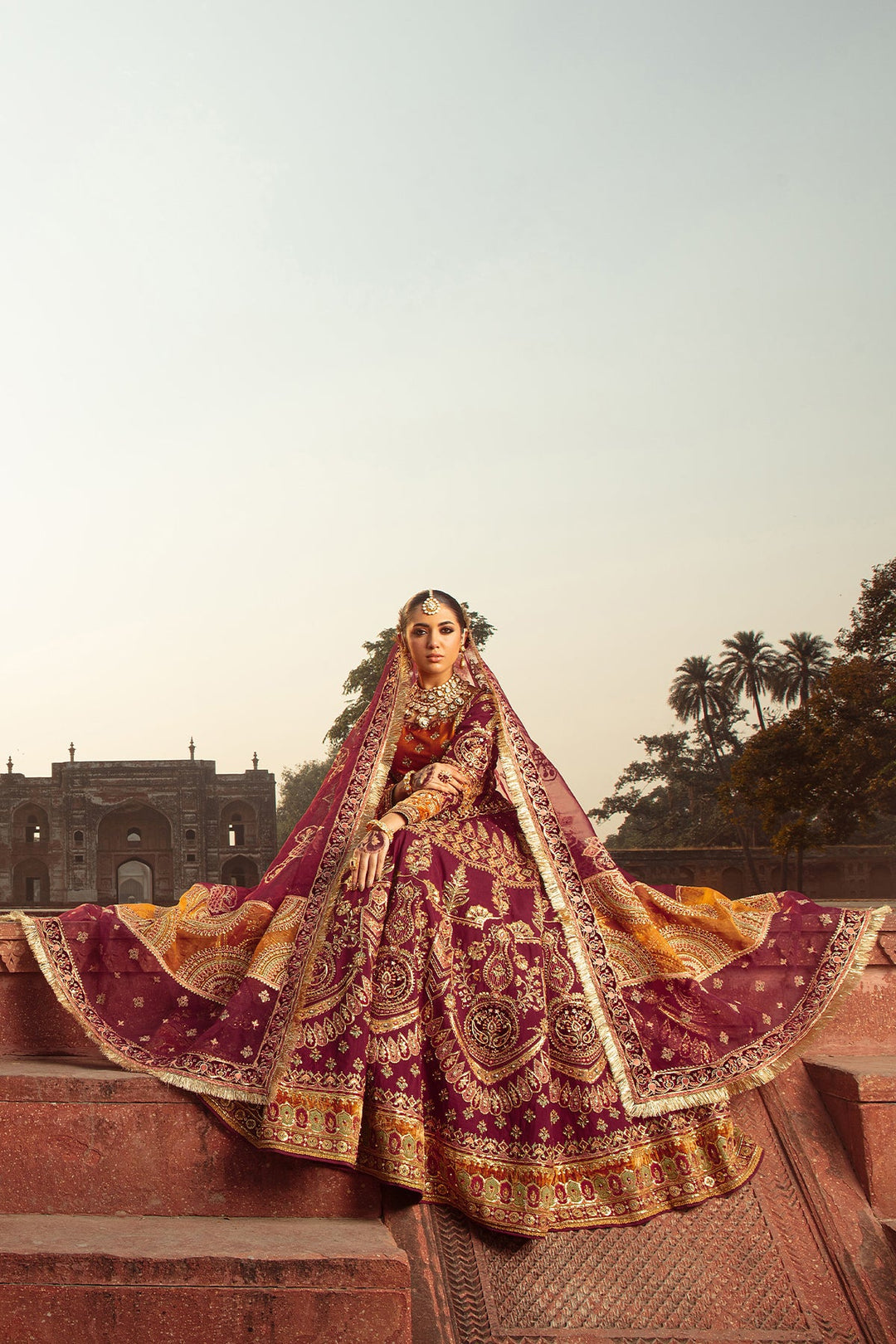 Luxurious Maroon Pakistani Bridal Dress with Intricate Embroidery
