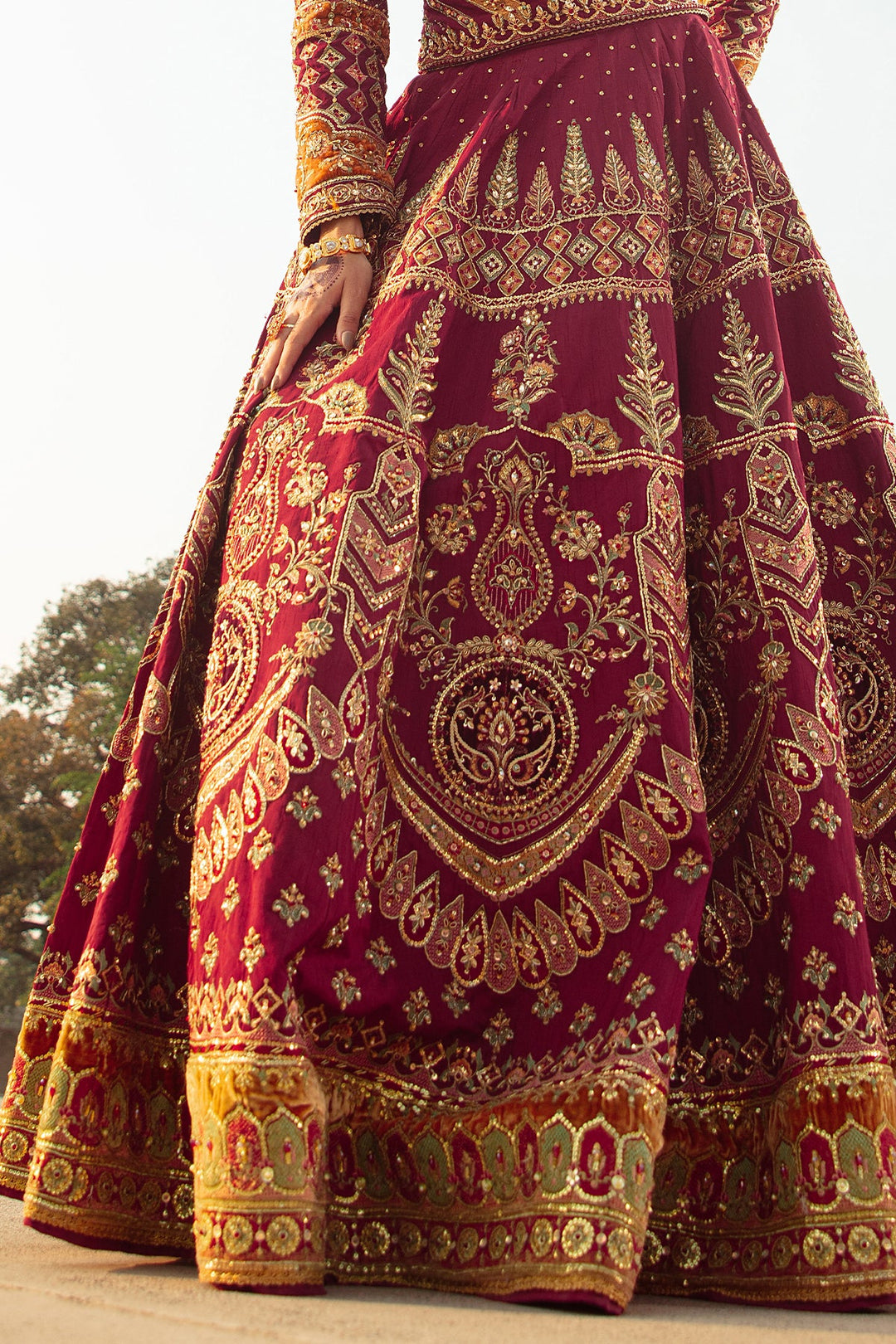 Luxurious Maroon Pakistani Bridal Dress with Intricate Embroidery