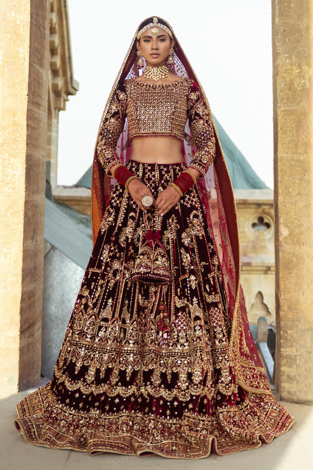 Majestic Dark Maroon Pakistani Bridal Dress with Heavy Embellishm