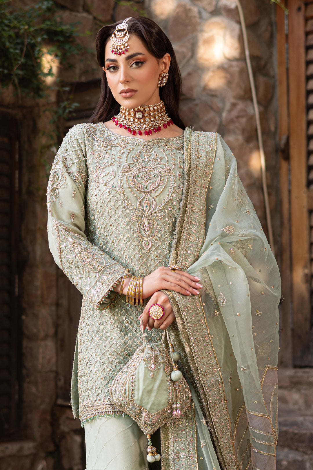 Pistachio Green Pakistani Bridal Dress with Heavy Embellishments