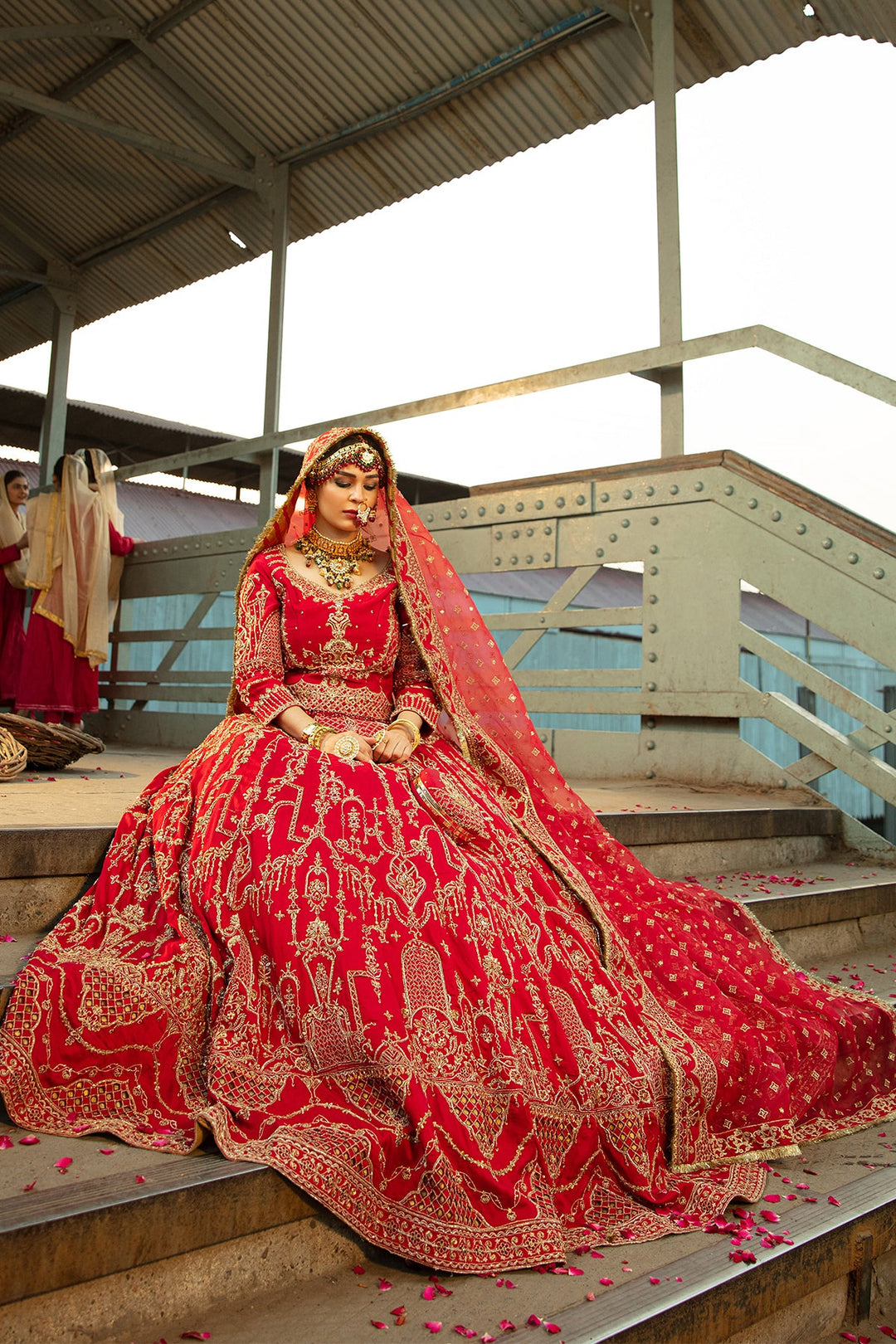 Carmine Red Pakistani Bridal Dress with Embellished Lehnga Choli