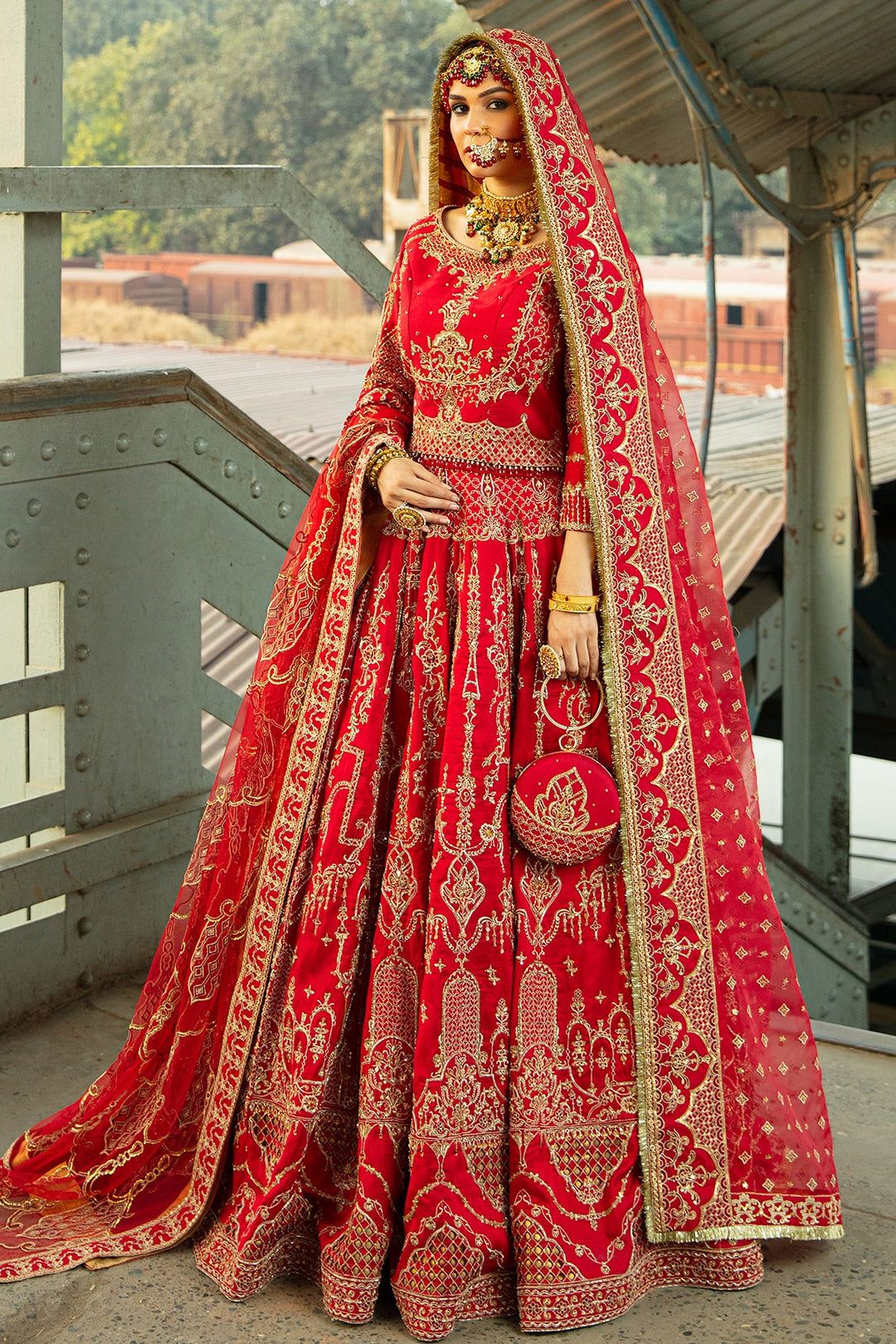 Carmine Red Pakistani Bridal Dress with Embellished Lehnga Choli