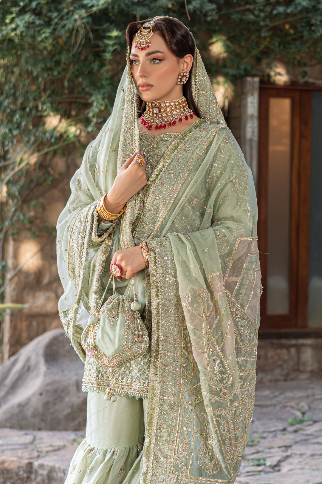 Pistachio Pakistani Bridal Dress with Heavy Embellishments