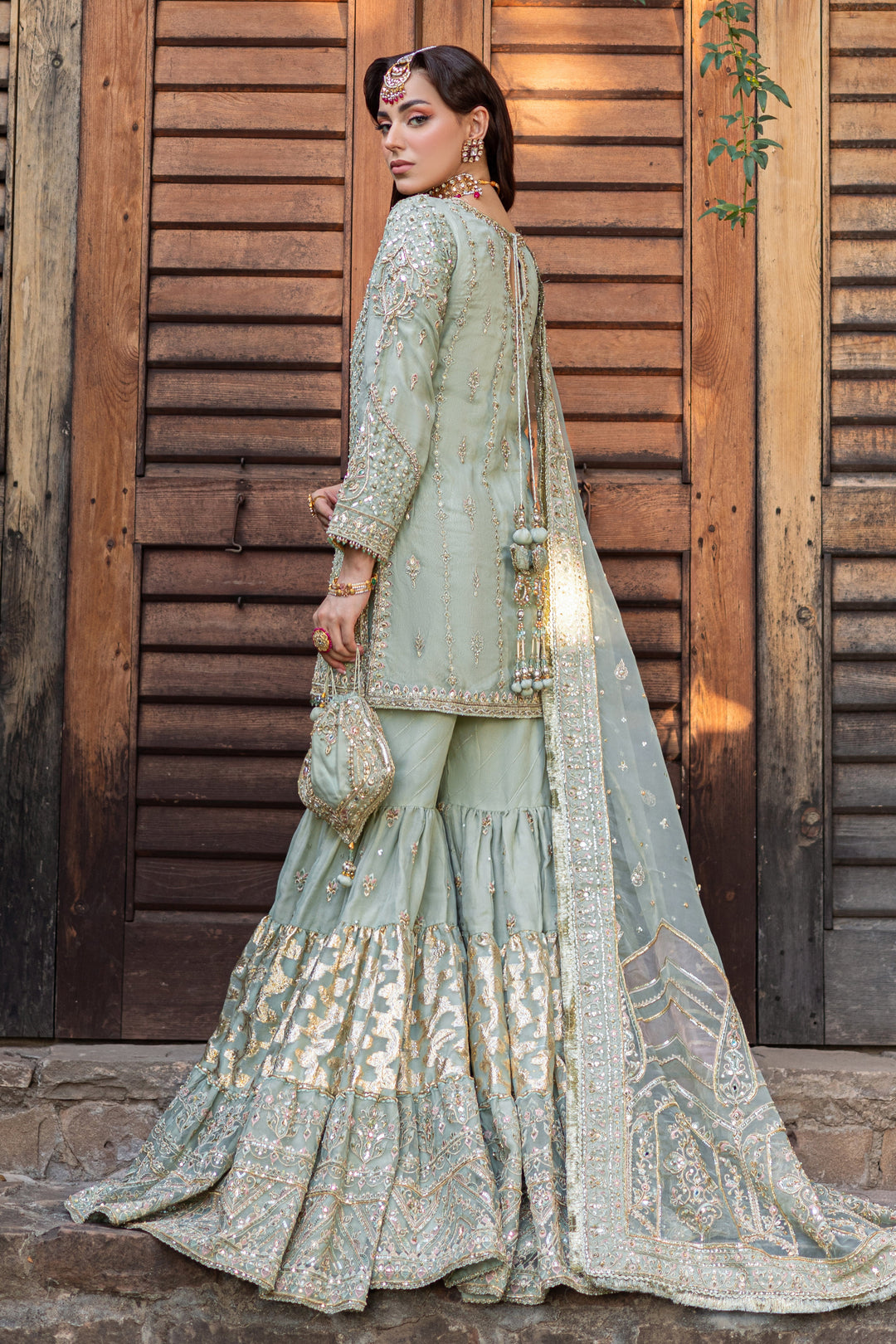 Pistachio Green Pakistani Bridal Dress with Heavy Embellishments