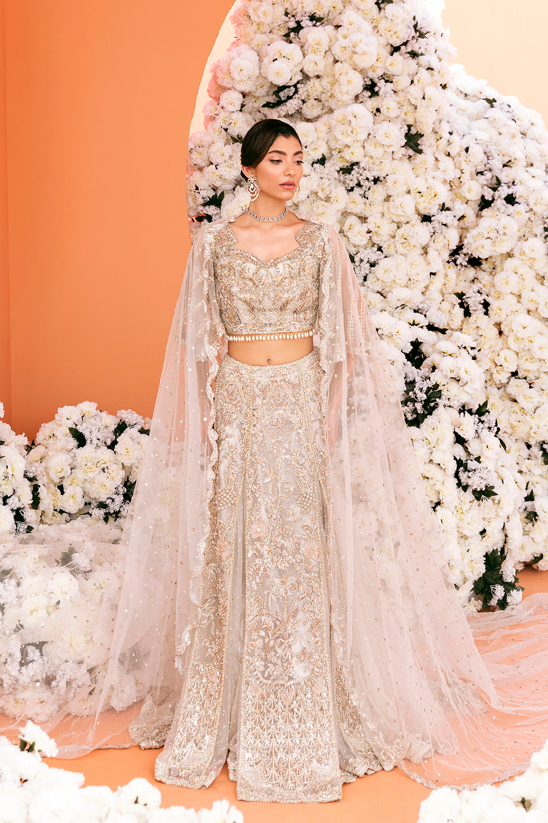 Elegant Pakistani Bridal Outfit in Ivory Silk with Intricate Embr