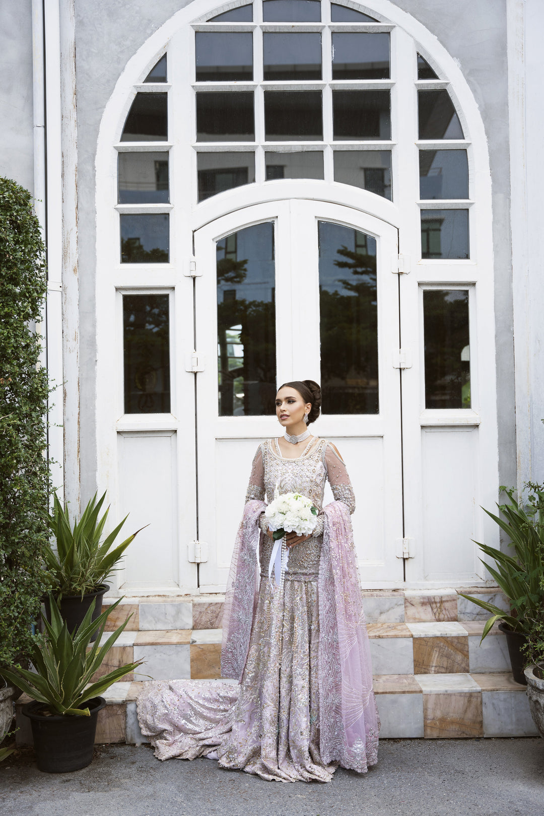 Icy Pink Net Pakistani Bridal Outfit with Exquisite Embroidery