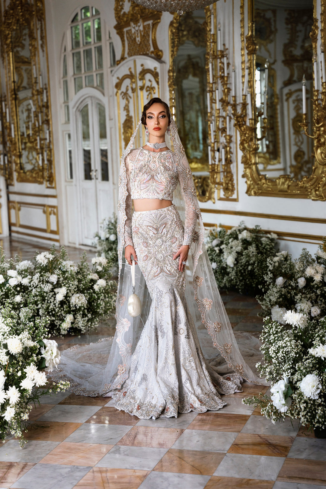 Elegant White Net Pakistani Bridal Dress with Intricate Embroider