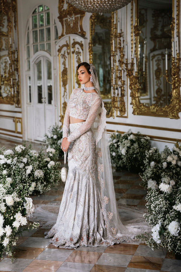 Elegant White Net Pakistani Bridal Dress with Intricate Embroider