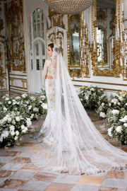 Elegant White Net Pakistani Bridal Dress with Intricate Embroider