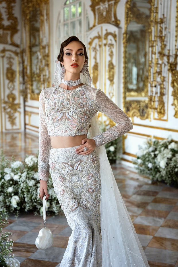 Elegant White Net Pakistani Bridal Dress with Intricate Embroider