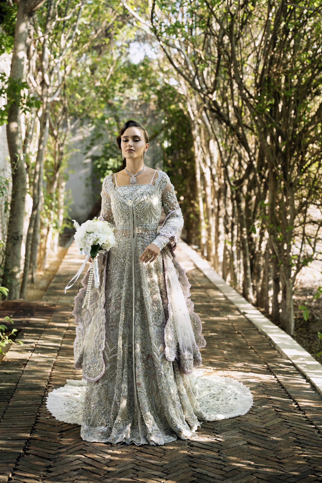 Silver Net Pakistani Bridal Outfit with Exquisite Embroidery