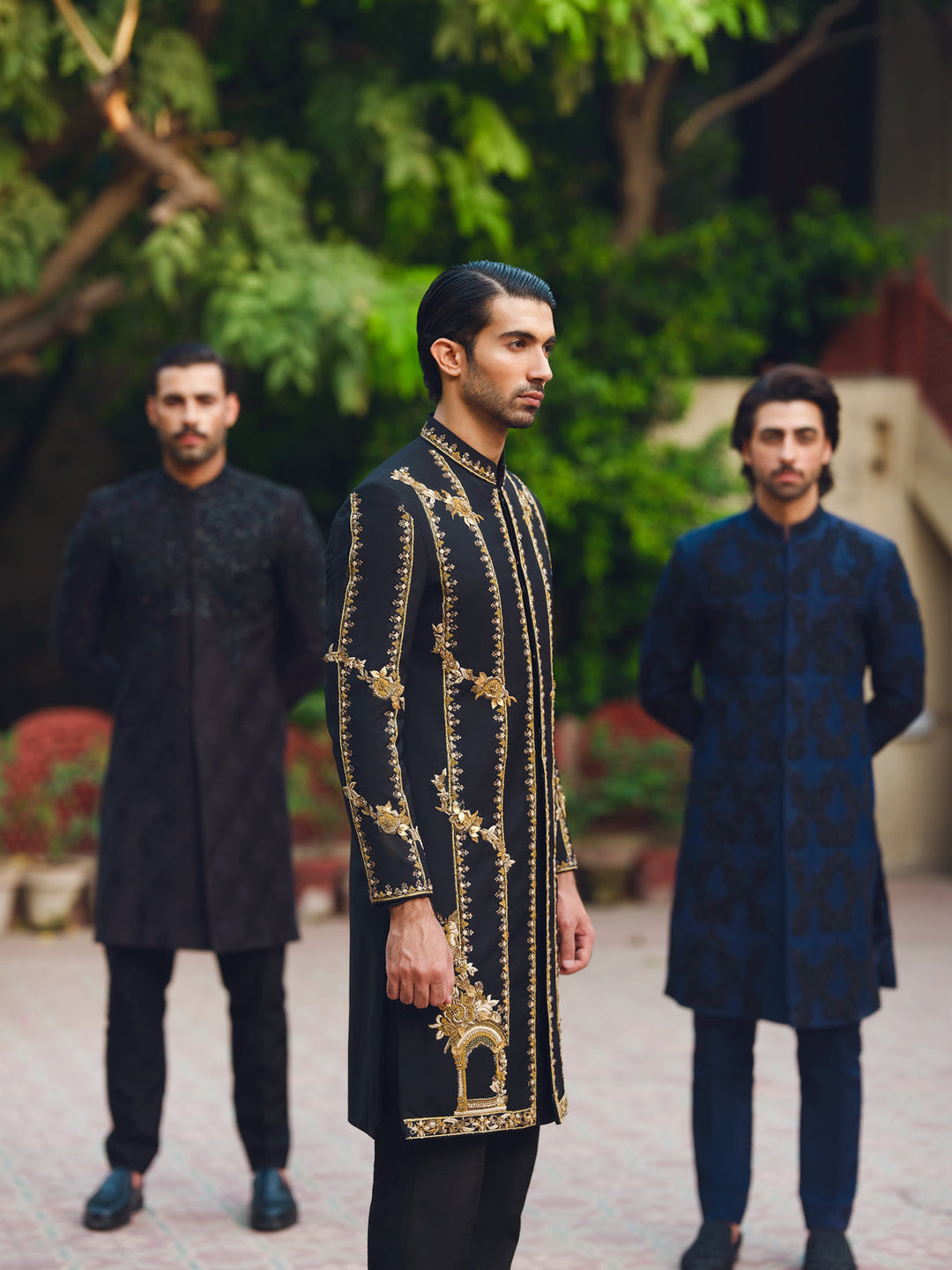 Elegant Black Sherwani with Intricate Gold Work
