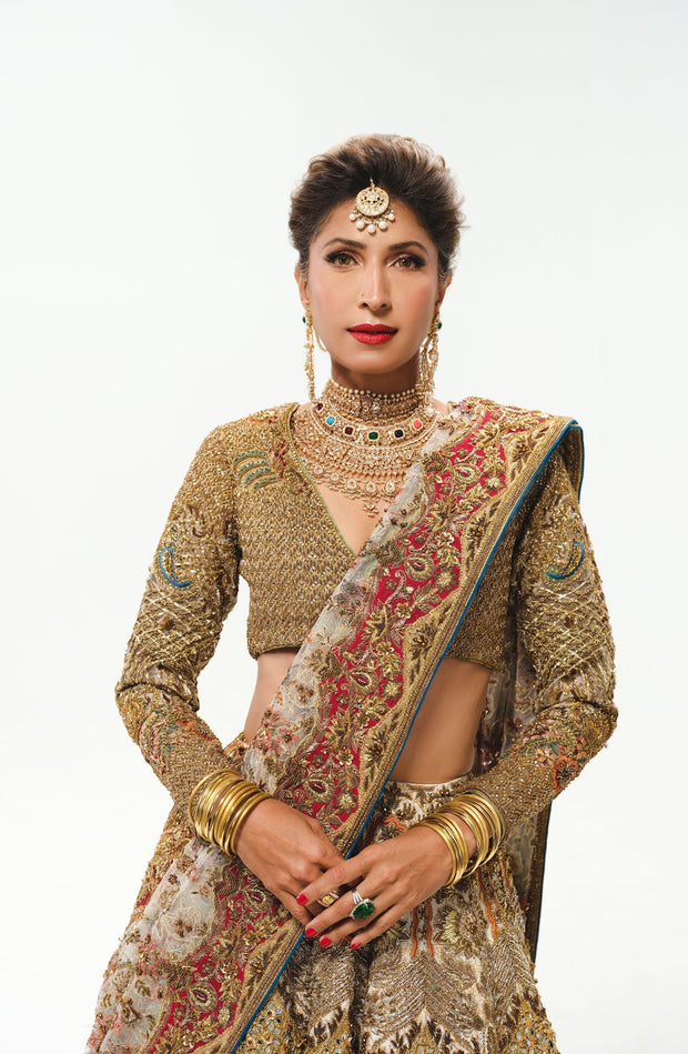 Elegant White Pakistani Bridal Lehenga with Colorful Embellishmen