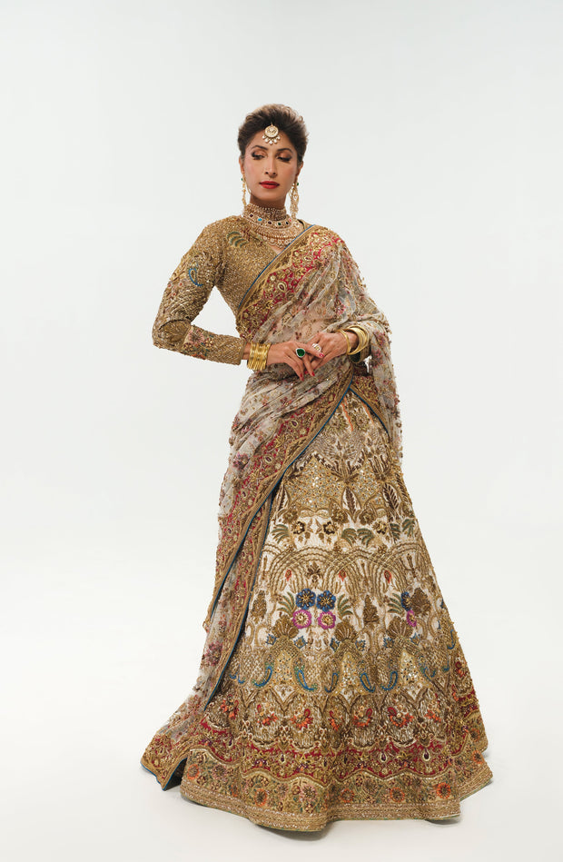 Elegant White Pakistani Bridal Lehenga with Colorful Embellishmen