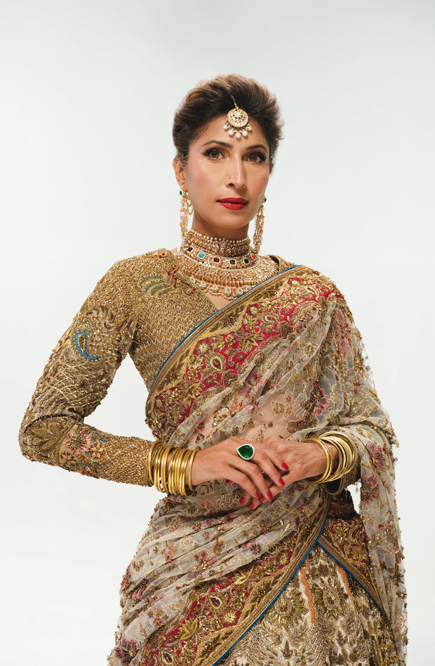 Elegant White Pakistani Bridal Lehenga with Colorful Embellishmen