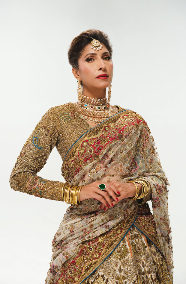 Elegant White Pakistani Bridal Lehenga with Colorful Embellishmen