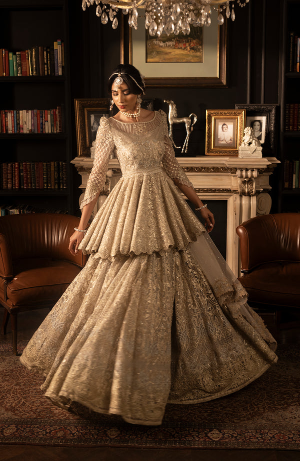 Elegant Pakistani Bridal Dress in Ivory Peplum Lehenga Style