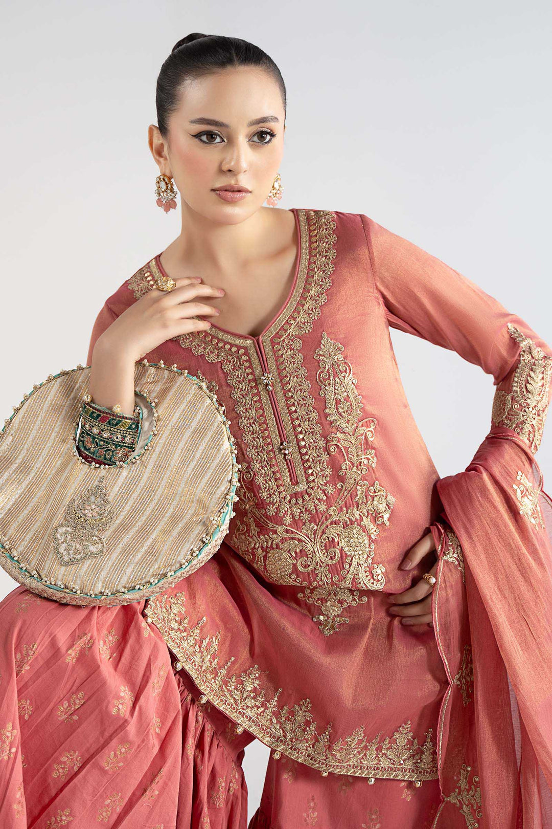 Elegant Pakistani Party Wear in Embroidered Masoori Suit