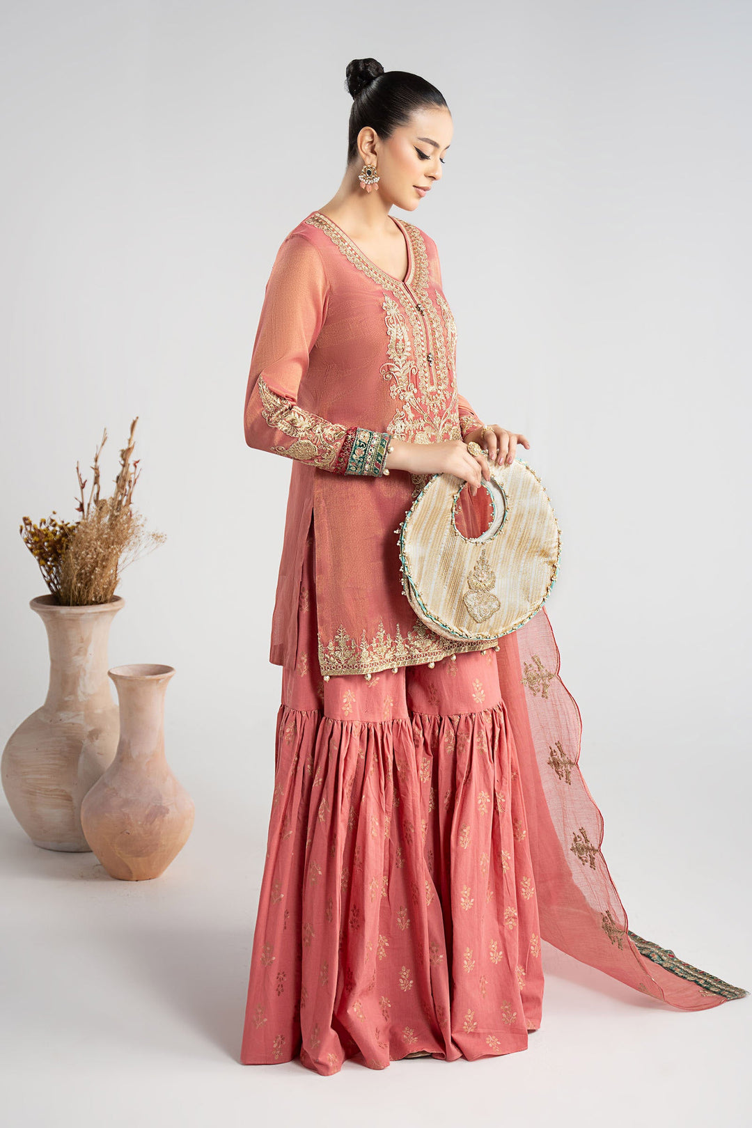 Elegant Pakistani Party Wear in Embroidered Masoori Suit