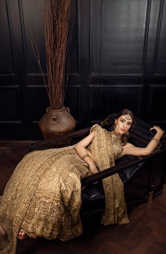 Ivory Pakistani Bridal Lehenga with Gold Zardozi Work