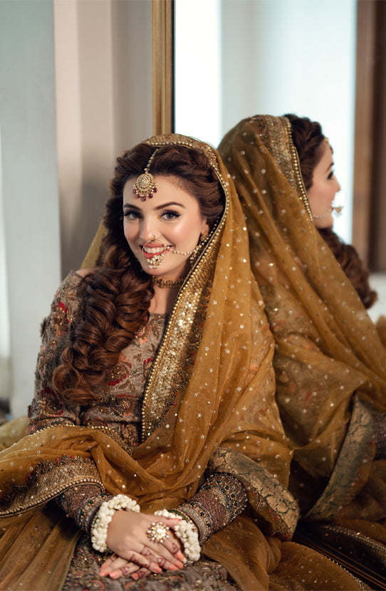 Elegant Yellow Pakistani Bridal Dress with Embroidered Details