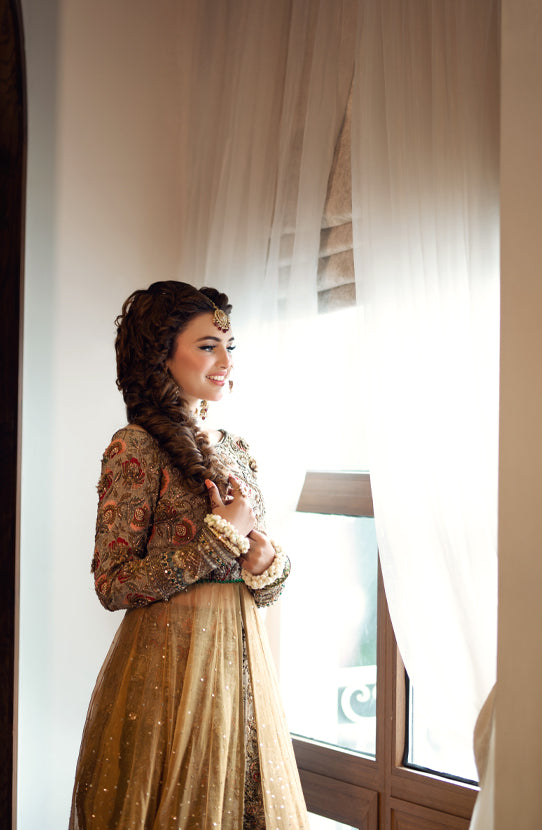 Elegant Yellow Pakistani Bridal Dress with Embroidered Details