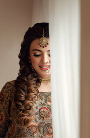 Elegant Yellow Pakistani Bridal Dress with Embroidered Details