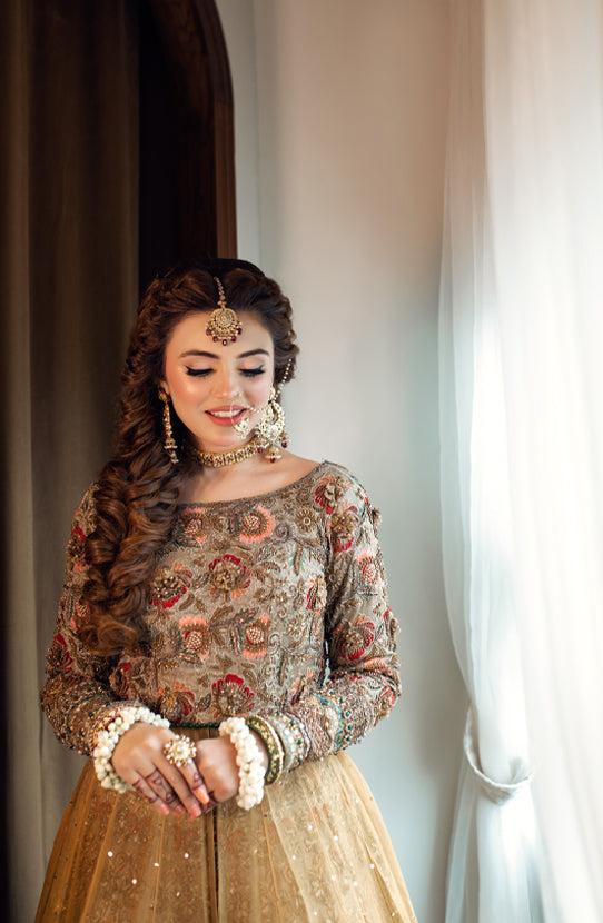 Elegant Yellow Pakistani Bridal Dress with Embroidered Details