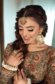Elegant Yellow Pakistani Bridal Dress with Embroidered Details