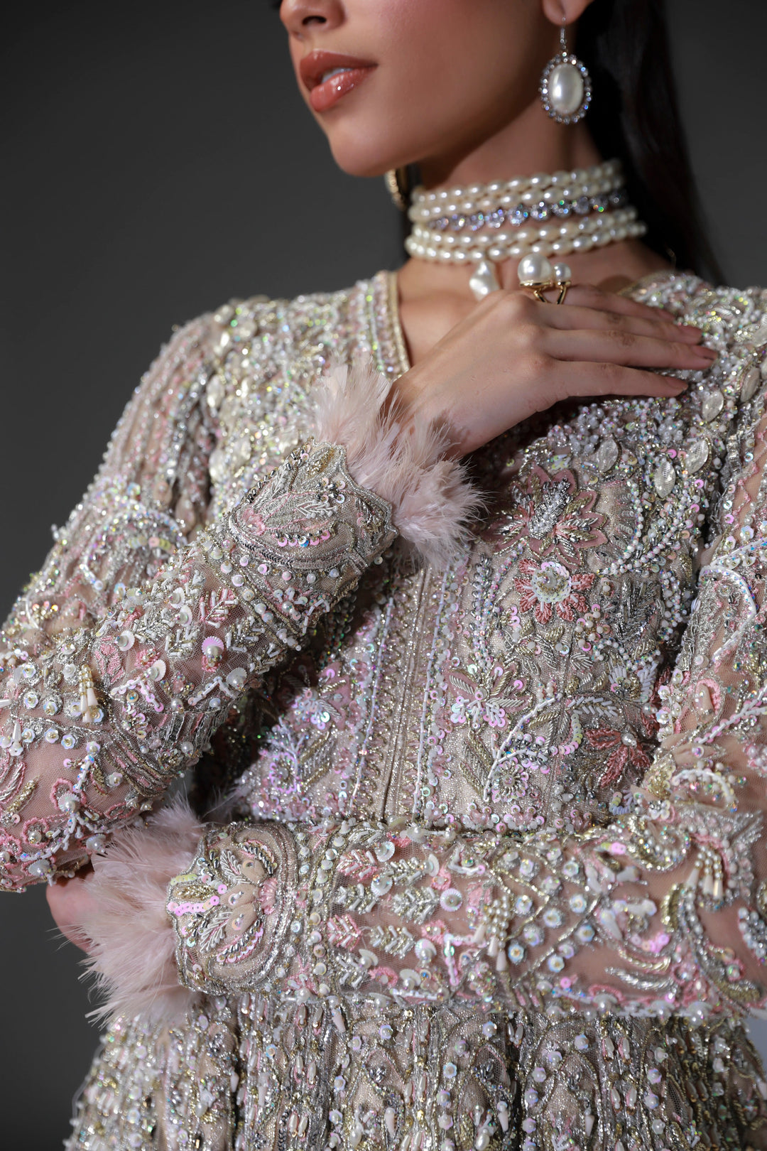 Subtle Pink Pakistani Bridal Outfit with Intricate Embroidery