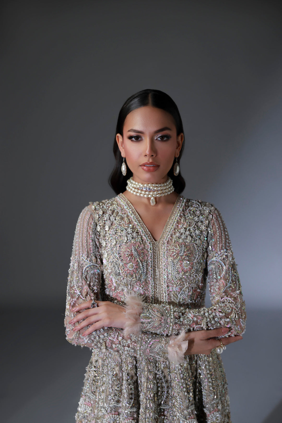 Subtle Pink Pakistani Bridal Outfit with Intricate Embroidery