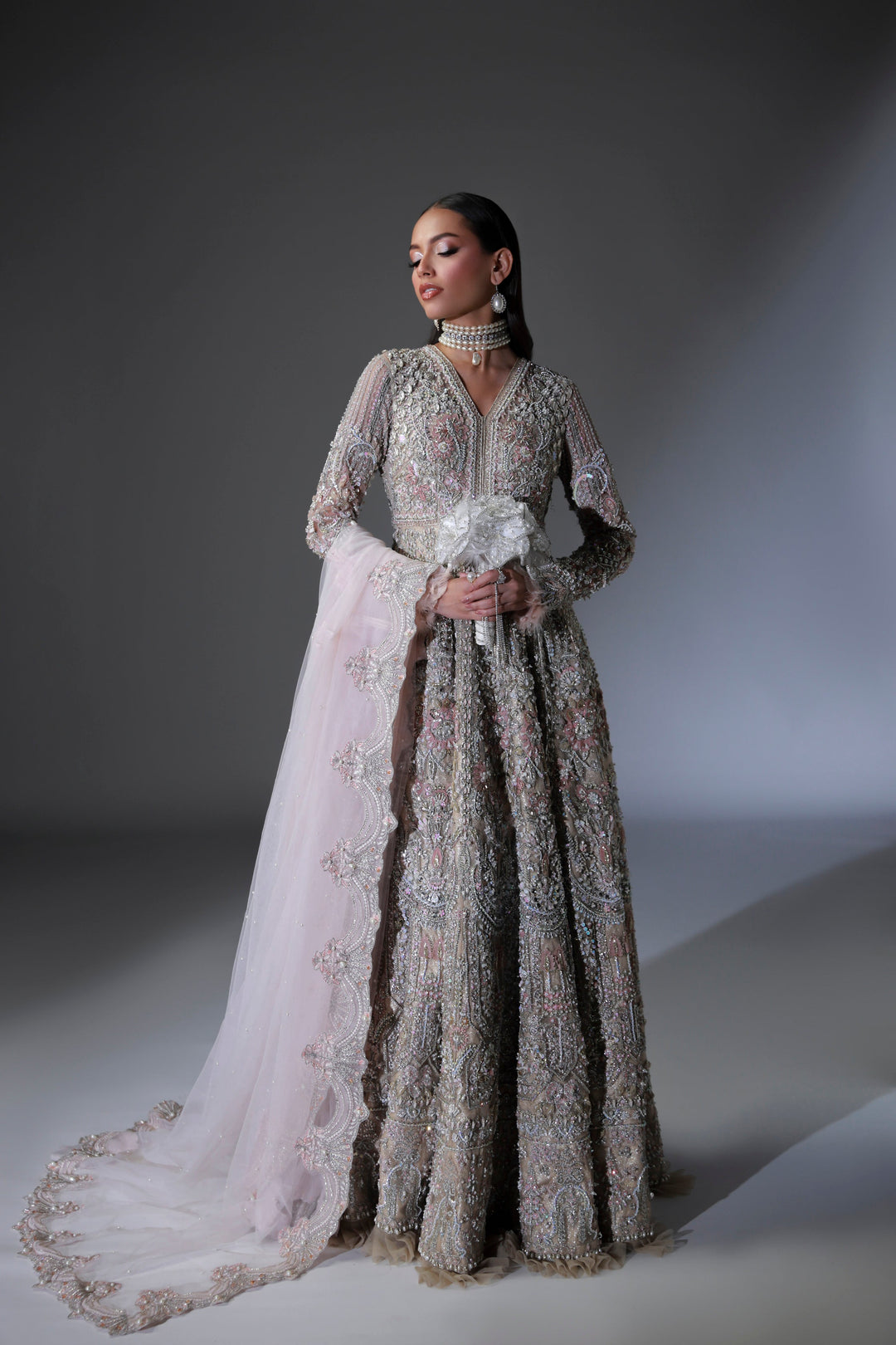 Subtle Pink Pakistani Bridal Outfit with Intricate Embroidery