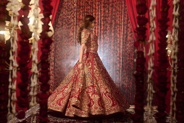 Golden bridal lehenga with red dupatta shop