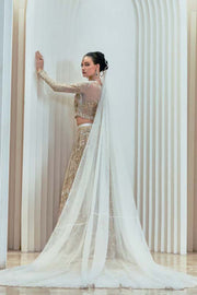 Elegant Pakistani Bridal Dress in Ivory Silk with Intricate Embro