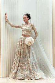 Elegant Pakistani Bridal Dress in Ivory Silk with Intricate Embro