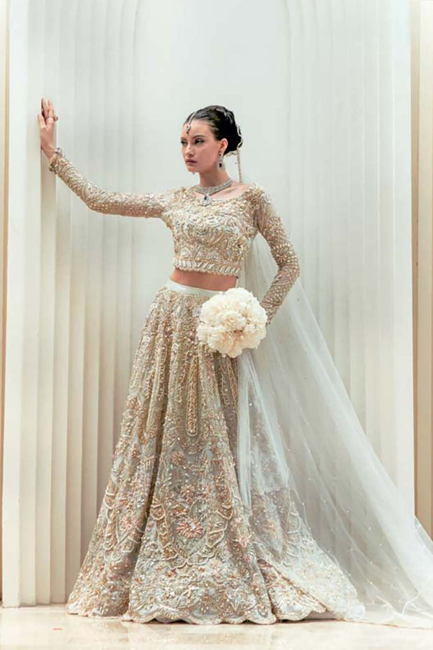 Elegant Pakistani Bridal Dress in Ivory Silk with Intricate Embro