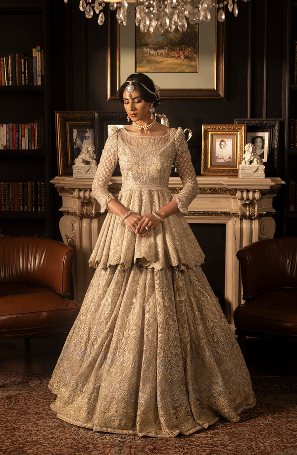 Latest Pakistani Bridal Dress in Ivory Peplum Lehenga Style