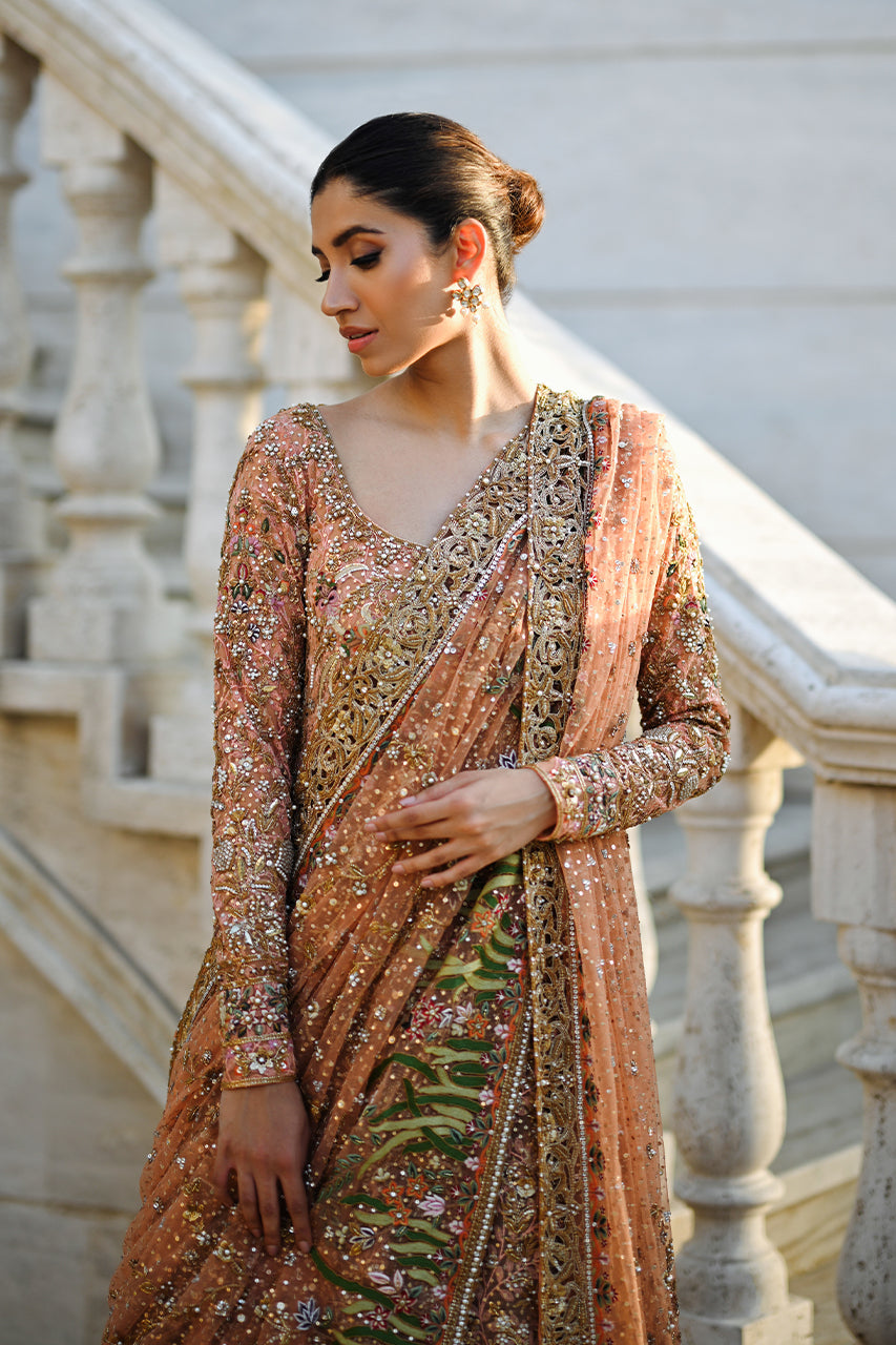 Elegant Peach Pakistani Bridal Lehenga for a Glamorous Wedding