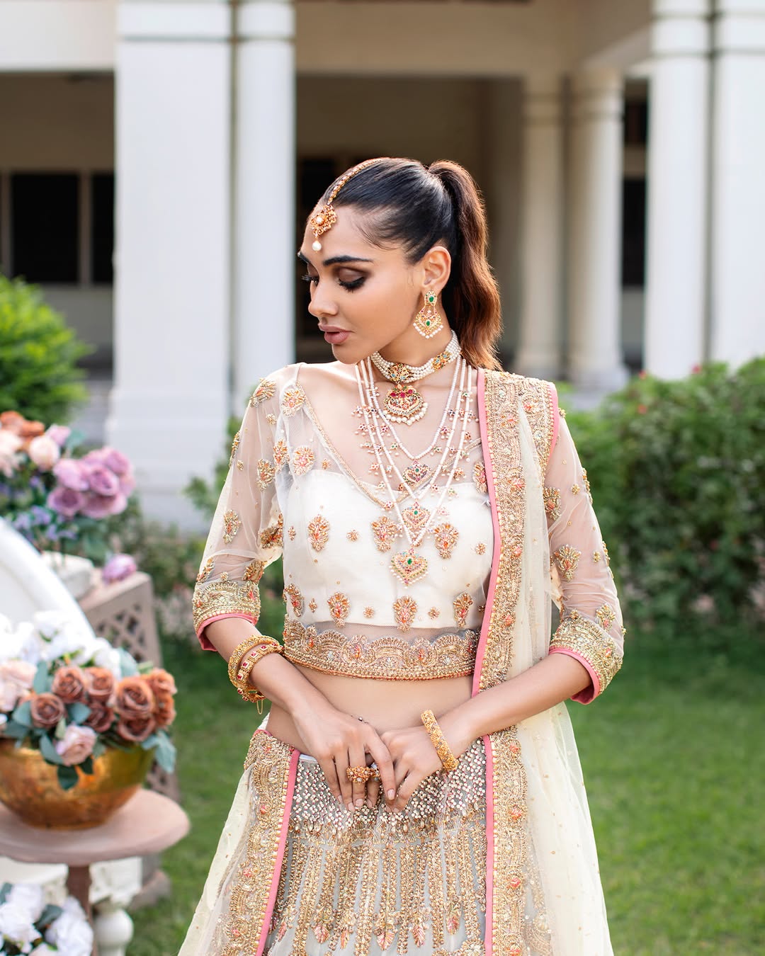 Latest Pakistani Bridal Dress in White Lehenga Choli Style