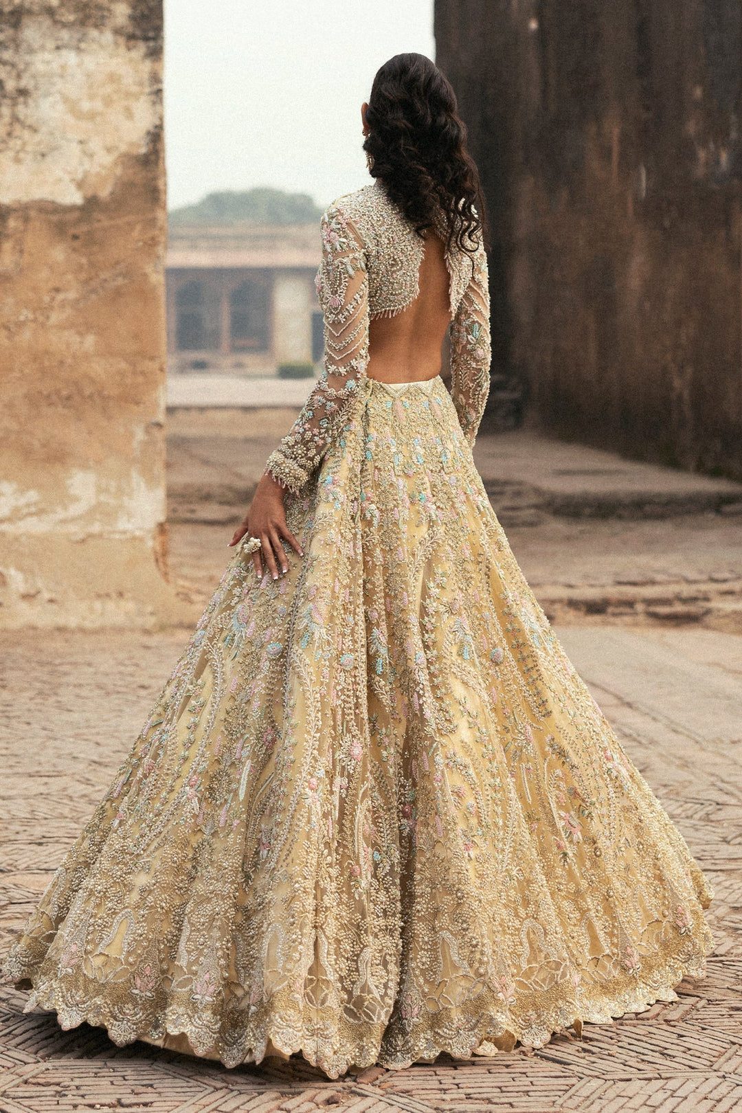 Latest Pakistani Bridal Dress in Yellow Choli Lehenga Style