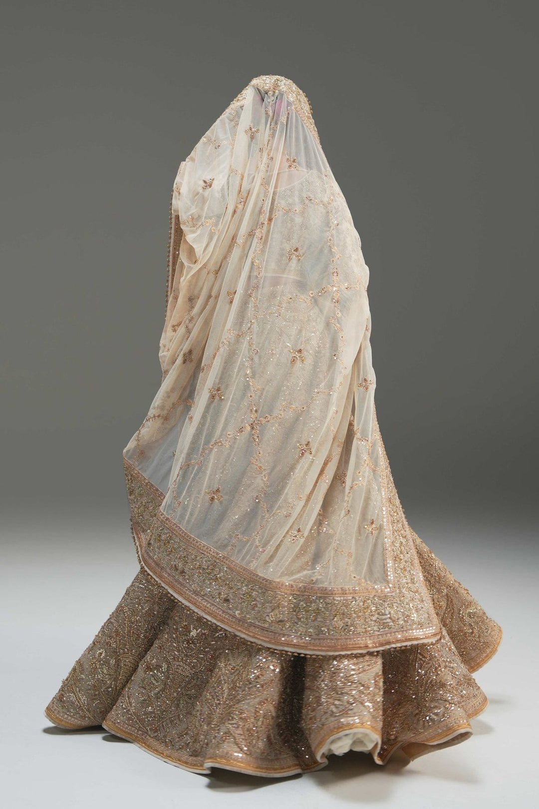 Elegant Pakistani Bridal Lehenga in Ivory Net Style