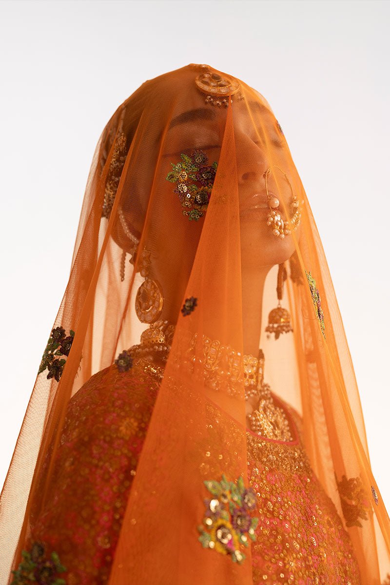Latest Pakistani Wedding Dress in Orange Lehenga Choli Style