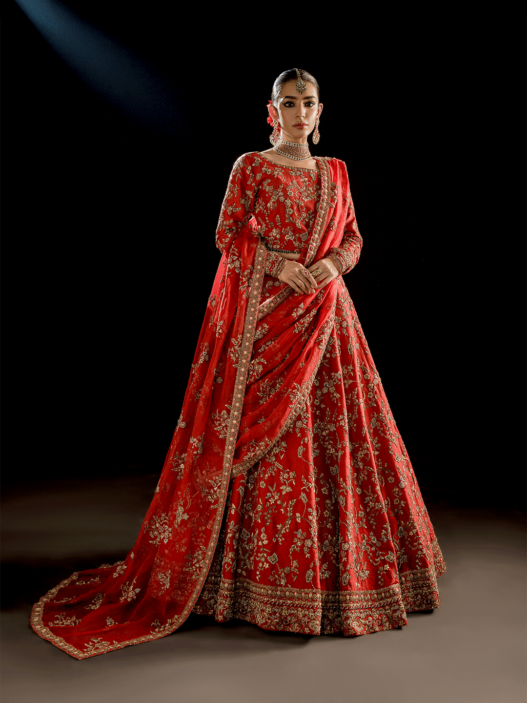 Latest Pakistani Bridal Dress in Red Choli and Lehenga Style