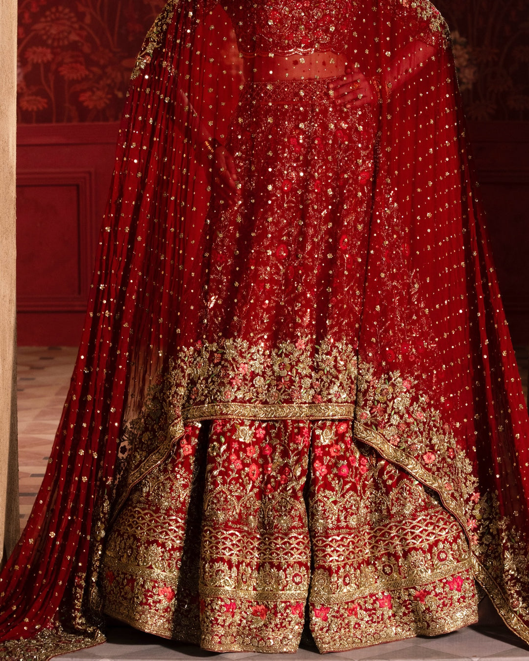 Latest Pakistani Bridal Dress in Red Choli and Lehenga Style