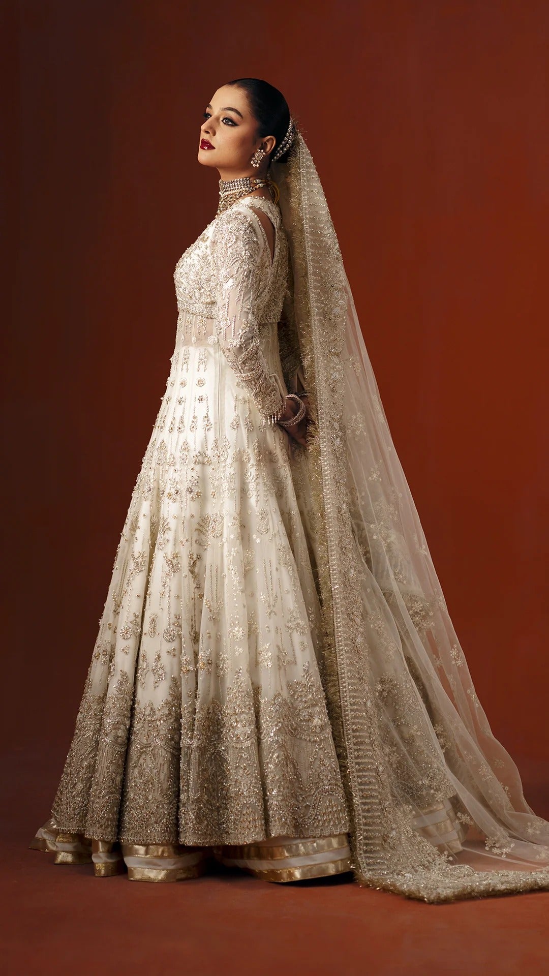 Latest Pakistani Bridal Dress in White Lehenga Gown Style