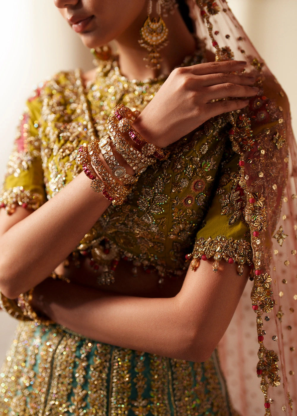 Latest Pakistani Bridal Outfit in Choli Lehenga Dupatta Style