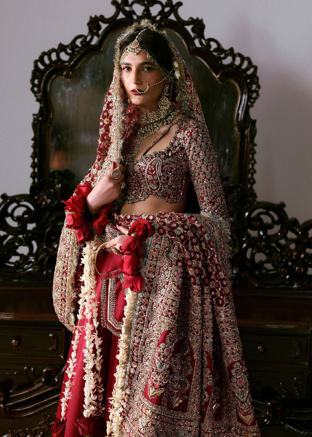 Latest Pakistani Bridal Outfit in Red Choli Lehenga Style